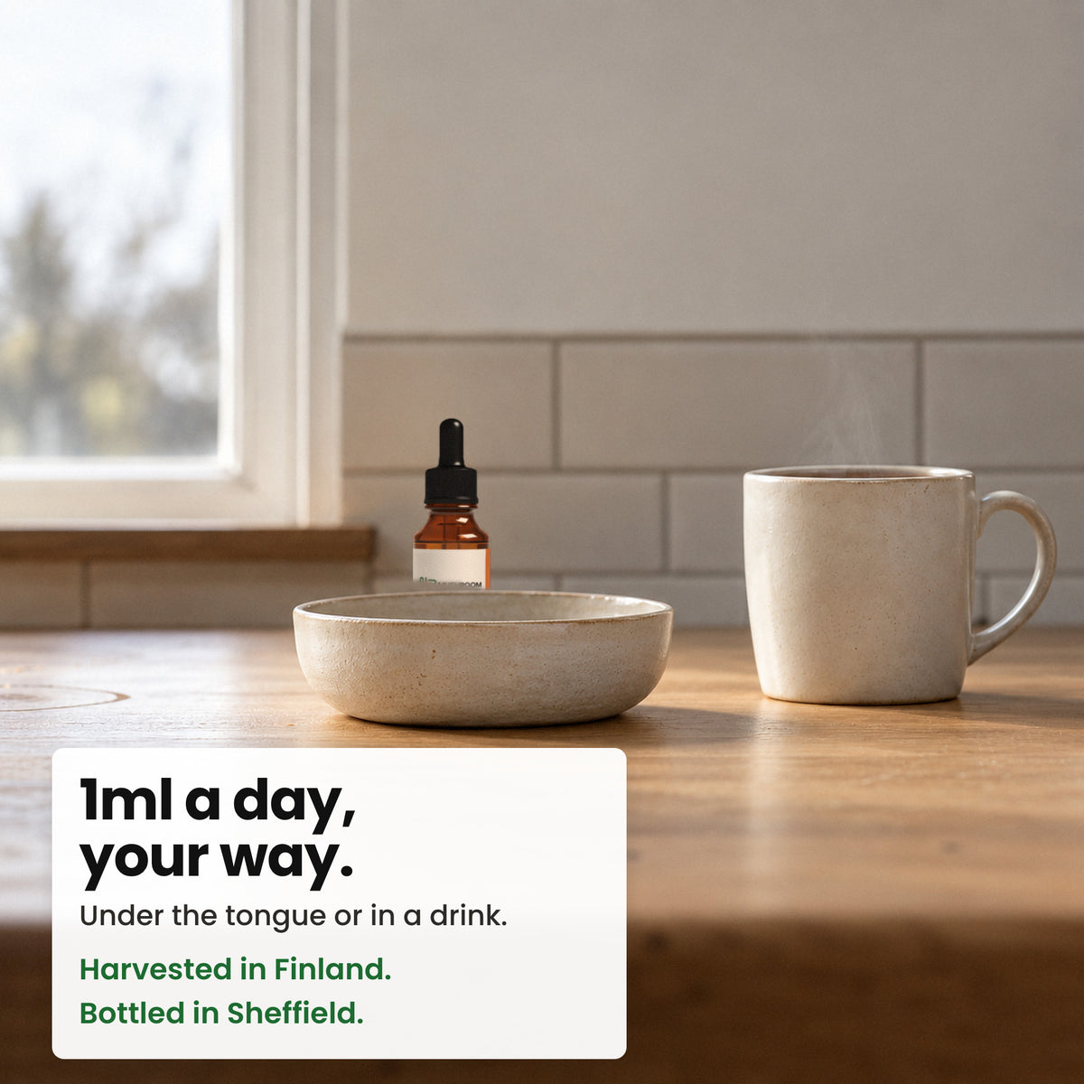 Turkey Tail Tincture bottle on a kitchen worktop with a stoneware bowl and a mug of tea